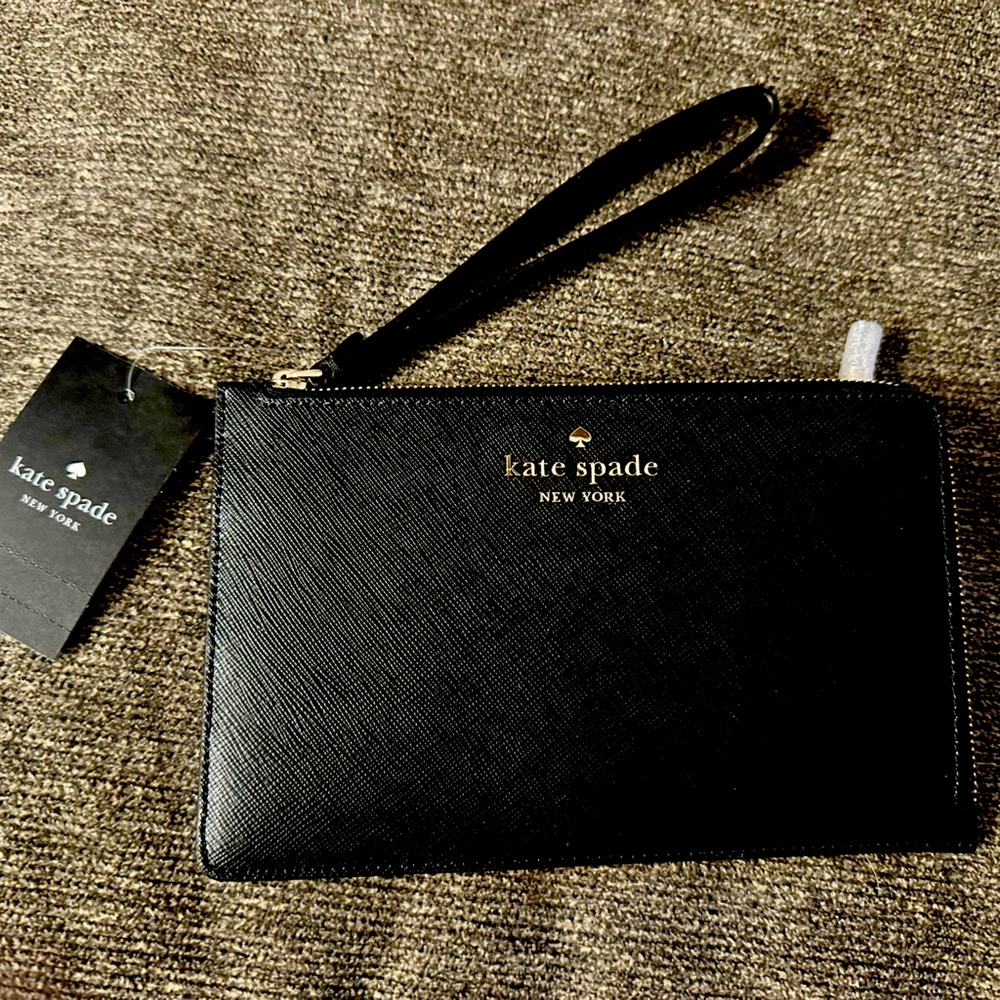 Kate Spade NWT leather wristlet. Gold zippers, outside pocket. 4 card slots